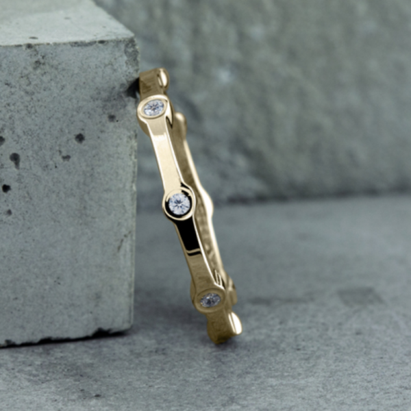 14K Gold Bezel Set Stationed Diamond Wedding Band - Image 9