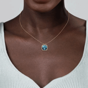 14K Yellow Gold Pendant with 10.92ct Cushion Cut Blue Topaz & .43ctw Diamond Halo 17.5